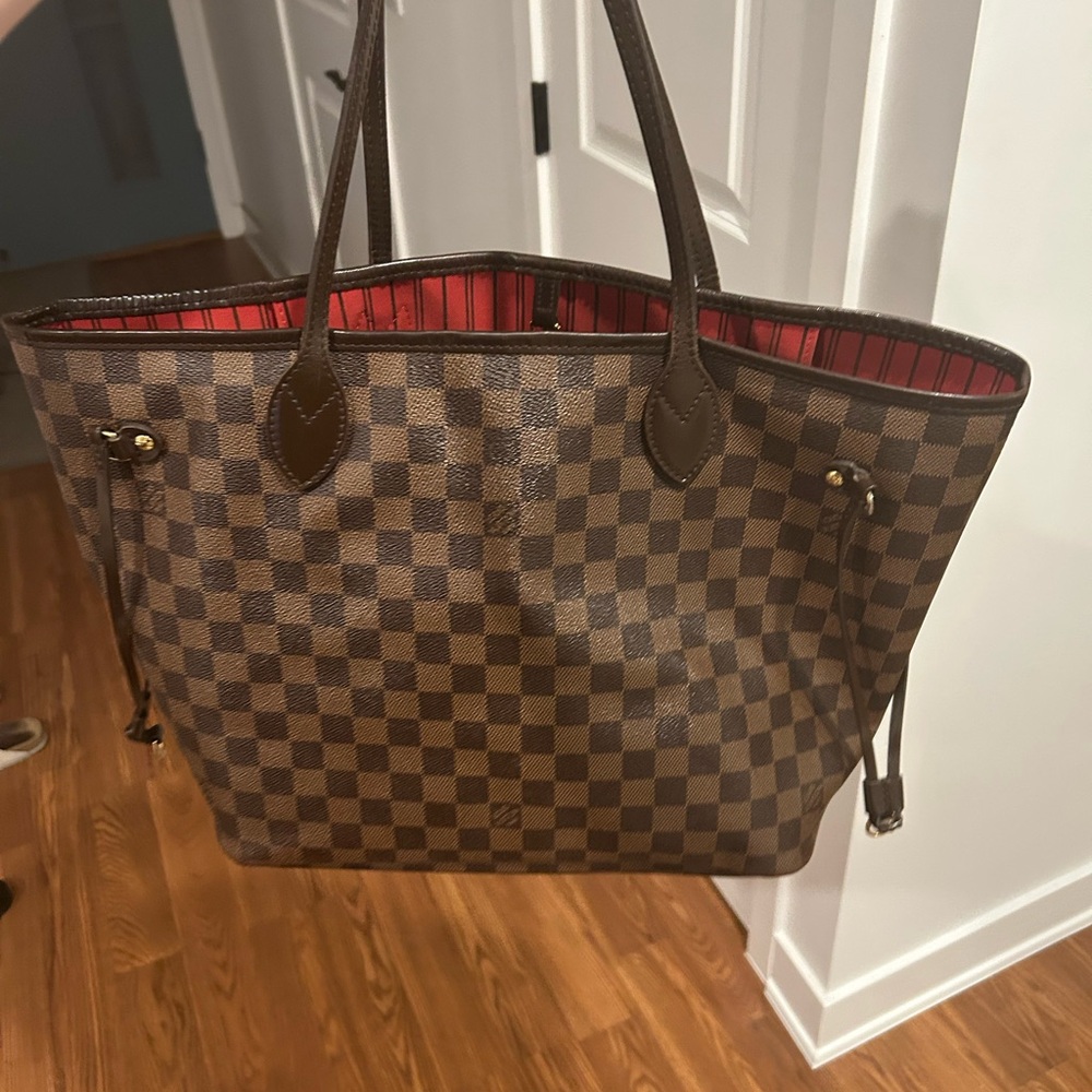 Authentic Louis Vuitton medium never full